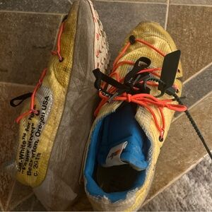 Off white Nike track shoes